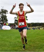 17 October 2021; Nicholas Griggs of Mid Ulster AC, Derry, celebrates winning the Junior Men's 6000m during the Autumn Open International Cross Country at the Sport Ireland Campus in Dublin. Photo by Sam Barnes/Sportsfile