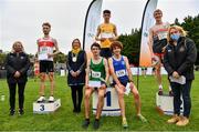17 October 2021; On the podium after the Senior Men's 7500m race, are, first place Darragh Mc Elhinney of UCD AC, Dublin, second place Tom Mortimer, third place Thomas Mc Stay of Galway City Harriers AC, Galway, fourth place Pierre Murchan of Dublin City Harriers AC, Dublin, fifth place Thomas Devaney of Castlebar AC, Mayo, with Collette Quinn, Regional Development Officer, Athletics Ireland, Seána Ó Rodaigh, Mayor of Fingal, and Brid Golden, Deputy President, Athletics Ireland, during the Autumn Open International Cross Country at the Sport Ireland Campus in Dublin. Photo by Sam Barnes/Sportsfile