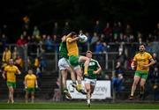 17 October 2021; Wayne McKeon of Ballinamore in action against Evan Harkin of Mohill during the Leitrim County Senior Club Football Championship Final match between Mohill and Ballinamore at Páirc Seán Mac Diarmada in Carrick-On-Shannon, Leitrim. Photo by David Fitzgerald/Sportsfile