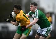 17 October 2021; Tom Prior of Ballinamore in action against Alan Armstrong of Mohill during the Leitrim County Senior Club Football Championship Final match between Mohill and Ballinamore at Páirc Seán Mac Diarmada in Carrick-On-Shannon, Leitrim. Photo by David Fitzgerald/Sportsfile
