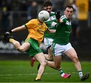 17 October 2021; Tom Prior of Ballinamore in action against Alan Armstrong of Mohill during the Leitrim County Senior Club Football Championship Final match between Mohill and Ballinamore at Páirc Seán Mac Diarmada in Carrick-On-Shannon, Leitrim. Photo by David Fitzgerald/Sportsfile
