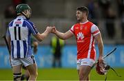 17 October 2021; David Treacy of Cuala bumps fists with James Madden of Ballyboden St Enda's after the Go Ahead Dublin County Senior Club Hurling Championship Quarter-Final match between Ballyboden St Enda's and Cuala at Parnell Park in Dublin. Photo by Piaras Ó Mídheach/Sportsfile