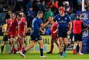 16 October 2021; Josh van der Flier, right, and Jordan Larmour of Leinster after the United Rugby Championship match between Leinster and Scarlets at the RDS Arena in Dublin. Photo by Ramsey Cardy/Sportsfile