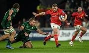 16 October 2021; John Ryan of Munster, supported by team-mate Joey Carbery, right, gets away from Finlay Bealham, centre, and Cian Prendergast of Connacht during the United Rugby Championship match between Munster and Connacht at Thomond Park in Limerick. Photo by Piaras Ó Mídheach/Sportsfile