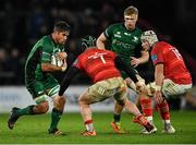 16 October 2021; Jarrad Butler of Connacht in action against Chris Cloete, 7, and Fineen Wycherley of Munster during the United Rugby Championship match between Munster and Connacht at Thomond Park in Limerick. Photo by Piaras Ó Mídheach/Sportsfile