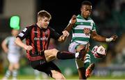 18 October 2021; Rory Feely of Bohemians in action against Aidomo Emakhu of Shamrock Rovers during the SSE Airtricity League Premier Division match between Shamrock Rovers and Bohemians at Tallaght Stadium in Dublin. Photo by Seb Daly/Sportsfile
