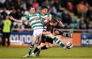 18 October 2021; Liam Burt of Bohemians in action against Sean Kavanagh, left, and Neil Farrugia of Shamrock Rovers during the SSE Airtricity League Premier Division match between Shamrock Rovers and Bohemians at Tallaght Stadium in Dublin. Photo by Stephen McCarthy/Sportsfile