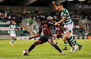 18 October 2021; Promise Omochere of Bohemians in action against Sean Hoare of Shamrock Rovers during the SSE Airtricity League Premier Division match between Shamrock Rovers and Bohemians at Tallaght Stadium in Dublin. Photo by Seb Daly/Sportsfile