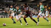 18 October 2021; Promise Omochere of Bohemians in action against Sean Hoare, left, and Sean Gannon of Shamrock Rovers during the SSE Airtricity League Premier Division match between Shamrock Rovers and Bohemians at Tallaght Stadium in Dublin. Photo by Seb Daly/Sportsfile