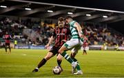 18 October 2021; Neil Farrugia of Shamrock Rovers in action against Rory Feely of Bohemians during the SSE Airtricity League Premier Division match between Shamrock Rovers and Bohemians at Tallaght Stadium in Dublin. Photo by Seb Daly/Sportsfile