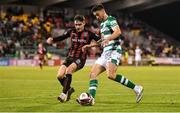 18 October 2021; Neil Farrugia of Shamrock Rovers in action against Dawson Devoy of Bohemians during the SSE Airtricity League Premier Division match between Shamrock Rovers and Bohemians at Tallaght Stadium in Dublin. Photo by Seb Daly/Sportsfile