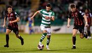 18 October 2021; Danny Mandroiu of Shamrock Rovers in action against Keith Buckley, left, and Rory Feely of Bohemians during the SSE Airtricity League Premier Division match between Shamrock Rovers and Bohemians at Tallaght Stadium in Dublin. Photo by Seb Daly/Sportsfile