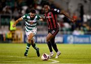 18 October 2021; Roberto Lopes of Shamrock Rovers fouls Promise Omochere of Bohemians, resulting in a red card, during the SSE Airtricity League Premier Division match between Shamrock Rovers and Bohemians at Tallaght Stadium in Dublin. Photo by Seb Daly/Sportsfile