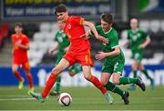 19 October 2021; Brian Moore of Republic of Ireland in action against Charlie Crew of Wales during the Victory Shield match between Wales and Republic of Ireland at Seaview in Belfast. Photo by Ramsey Cardy/Sportsfile