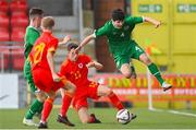 19 October 2021; Eoin Sheeran of Republic of Ireland is tackled by Alfie Cunningham of Wales during the Victory Shield match between Wales and Republic of Ireland at Seaview in Belfast. Photo by Ramsey Cardy/Sportsfile