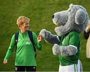19 October 2021; Manager Vera Pauw meets Macúl, the official FAI mascot, before a Republic of Ireland training session at the FAI National Training Centre in Abbotstown, Dublin. Photo by Stephen McCarthy/Sportsfile