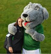 19 October 2021; Jessica Ziu meets Macúl, the official FAI mascot, before a Republic of Ireland training session at the FAI National Training Centre in Abbotstown, Dublin. Photo by Stephen McCarthy/Sportsfile