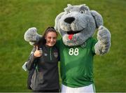 19 October 2021; Jessica Ziu meets Macúl, the official FAI mascot, before a Republic of Ireland training session at the FAI National Training Centre in Abbotstown, Dublin. Photo by Stephen McCarthy/Sportsfile