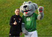 19 October 2021; Katie McCabe meets Macúl, the official FAI mascot, before a Republic of Ireland training session at the FAI National Training Centre in Abbotstown, Dublin. Photo by Stephen McCarthy/Sportsfile