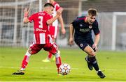 20 October 2021; Thomas Lonergan of St Patrick's Athletic in action against Viktor Radojevic of Crvena Zvezda during the UEFA Youth League first round second leg match between Crvena Zvezda and St Patrick’s Athletic at Cukaricki Stadium in Belgrade, Serbia. Photo by Nikola Krstic/Sportsfile