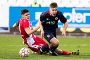 20 October 2021; Thomas Lonergan of St Patrick's Athletic in action against Stefan Lekovic of Crvena Zvezda during the UEFA Youth League first round second leg match between Crvena Zvezda and St Patrick’s Athletic at Cukaricki Stadium in Belgrade, Serbia. Photo by Nikola Krstic/Sportsfile