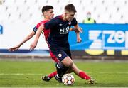 20 October 2021; Thomas Lonergan of St Patrick's Athletic in action against Stefan Lekovic of Crvena Zvezda during the UEFA Youth League first round second leg match between Crvena Zvezda and St Patrick’s Athletic at Cukaricki Stadium in Belgrade, Serbia. Photo by Nikola Krstic/Sportsfile