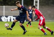 20 October 2021; Thomas Lonergan of St Patrick's Athletic in action against Bratislav Maric of Crvena Zvezda during the UEFA Youth League first round second leg match between Crvena Zvezda and St Patrick’s Athletic at Cukaricki Stadium in Belgrade, Serbia. Photo by Nikola Krstic/Sportsfile