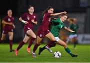 20 October 2021; Rebecca Watkins of Republic of Ireland in action against Tara Bourne of England during the UEFA Women's U19 Championship Qualifier match between Republic of Ireland and England at Markets Field in Limerick. Photo by Eóin Noonan/Sportsfile