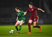 20 October 2021; Aoife Horgan of Republic of Ireland in action against Teyah Goldie of England during the UEFA Women's U19 Championship Qualifier match between Republic of Ireland and England at Markets Field in Limerick. Photo by Eóin Noonan/Sportsfile