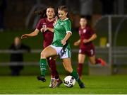 20 October 2021; Rebecca Watkins of Republic of Ireland is tackled by Tara Bourne of England during the UEFA Women's U19 Championship Qualifier match between Republic of Ireland and England at Markets Field in Limerick. Photo by Eóin Noonan/Sportsfile