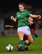 20 October 2021; Rebecca Watkins of Republic of Ireland is tackled by Tara Bourne of England during the UEFA Women's U19 Championship Qualifier match between Republic of Ireland and England at Markets Field in Limerick. Photo by Eóin Noonan/Sportsfile