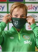 20 October 2021; Manager Vera Pauw removes her mask before speaking to media ahead of a Republic of Ireland training session at Tallaght Stadium in Dublin. Photo by Stephen McCarthy/Sportsfile