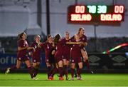 20 October 2021; Freya Gregory of England, right, celebrates with team-mates after scoring her side's first goal during the UEFA Women's U19 Championship Qualifier match between Republic of Ireland and England at Markets Field in Limerick. Photo by Eóin Noonan/Sportsfile