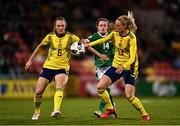 21 October 2021; Heather Payne of Republic of Ireland in action against Magdalena Eriksson, left, and Amanda Ilestedt of Sweden during the FIFA Women's World Cup 2023 qualifier group A match between Republic of Ireland and Sweden at Tallaght Stadium in Dublin. Photo by Eóin Noonan/Sportsfile