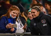 21 October 2021; Jamie Finn of Republic of Ireland with a supporter after the FIFA Women's World Cup 2023 qualifier group A match between Republic of Ireland and Sweden at Tallaght Stadium in Dublin. Photo by Eóin Noonan/Sportsfile