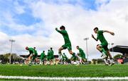 22 October 2021; The Republic of Ireland team warm-up before the Victory Shield match between Northern Ireland and Republic of Ireland at Blanchflower Park in Belfast. Photo by Ramsey Cardy/Sportsfile