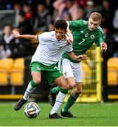 22 October 2021; Trent Kone Doherty of Republic of Ireland in action against Francis Turley of Northern Ireland during the Victory Shield match between Northern Ireland and Republic of Ireland at Blanchflower Park in Belfast. Photo by Ramsey Cardy/Sportsfile