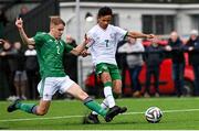 22 October 2021; Trent Kone Doherty of Republic of Ireland is tackled by Bobby Harvey of Northern Ireland during the Victory Shield match between Northern Ireland and Republic of Ireland at Blanchflower Park in Belfast. Photo by Ramsey Cardy/Sportsfile