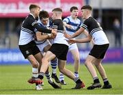 22 October 2021; Derry Moloney of Blackrock College is tackled by Newbridge College players, from left, Ciarán Mangan, Paddy Taylor and Calum Murphy during the Bank of Ireland Leinster Schools Junior Cup Final match between Blackrock College and Newbridge College at Energia Park in Dublin. Photo by Piaras Ó Mídheach/Sportsfile