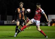 22 October 2021; Will Patching of Dundalk in action against Lee Desmond of St Patrick's Athletic during the Extra.ie FAI Cup semi-final match between St Patrick's Athletic and Dundalk at Richmond Park in Dublin. Photo by Seb Daly/Sportsfile