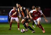 22 October 2021; Patrick Hoban of Dundalk in action against Jamie Lennon of St Patrick's Athletic during the Extra.ie FAI Cup Semi-Final match between St Patrick's Athletic and Dundalk at Richmond Park in Dublin. Photo by Ben McShane/Sportsfile