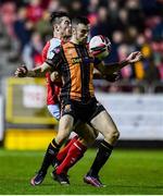 22 October 2021; Michael Duffy of Dundalk in action against Lee Desmond of St Patrick's Athletic during the Extra.ie FAI Cup Semi-Final match between St Patrick's Athletic and Dundalk at Richmond Park in Dublin. Photo by Ben McShane/Sportsfile