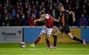 22 October 2021; Matty Smith of St Patrick's Athletic shoots to score his side's second goal, despite pressure from Dundalk's Daniel Cleary, during the Extra.ie FAI Cup semi-final match between St Patrick's Athletic and Dundalk at Richmond Park in Dublin. Photo by Seb Daly/Sportsfile