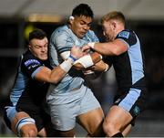 22 October 2021; Michael Ala'alatoa of Leinster is tackled by Jack Dempsey, left, and Kyle Steyn of Glasgow Warriors during the United Rugby Championship match between Glasgow Warriors and Leinster at Scotstoun Stadium in Glasgow, Scotland. Photo by Harry Murphy/Sportsfile