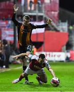 22 October 2021; Robbie Benson of St Patrick's Athletic in action against Daniel Kelly of Dundalk during the Extra.ie FAI Cup Semi-Final match between St Patrick's Athletic and Dundalk at Richmond Park in Dublin. Photo by Ben McShane/Sportsfile