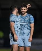 22 October 2021; Hugo Keenan, left, and Ross Byrne of Leinster celebrate after the United Rugby Championship match between Glasgow Warriors and Leinster at Scotstoun Stadium in Glasgow, Scotland. Photo by Harry Murphy/Sportsfile
