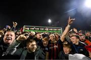22 October 2021; Georgie Kelly of Bohemians celebrates with supporters following the Extra.ie FAI Cup Semi-Final match between Bohemians and Waterford at Dalymount Park in Dublin. Photo by Stephen McCarthy/Sportsfile