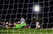 22 October 2021; Georgie Kelly of Bohemians scores his side's goal past Waterford goalkeeper Brian Murphy during the Extra.ie FAI Cup Semi-Final match between Bohemians and Waterford at Dalymount Park in Dublin. Photo by Stephen McCarthy/Sportsfile