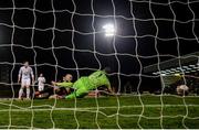 22 October 2021; Georgie Kelly of Bohemians scores his side's goal past Waterford goalkeeper Brian Murphy during the Extra.ie FAI Cup Semi-Final match between Bohemians and Waterford at Dalymount Park in Dublin. Photo by Stephen McCarthy/Sportsfile