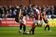 22 October 2021; Lee Desmond of St Patrick's Athletic in action against Will Patching of Dundalk during the Extra.ie FAI Cup semi-final match between St Patrick's Athletic and Dundalk at Richmond Park in Dublin. Photo by Seb Daly/Sportsfile